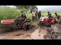 Massey Ferguson 6028 tractor stuck in mud - pulling out by New Holland 4710 tractor...