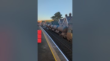 70 806 and too mucky to identify 70 at rear on RHTT with tones south through Kirkby Stephen at speed