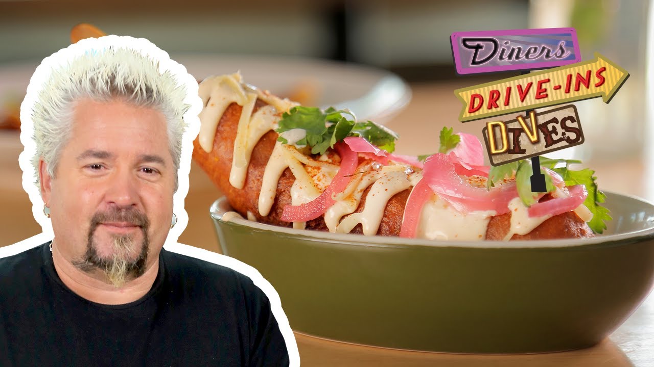 Guy Fieri Eats an ELOTE Corn dog | Diners, Drive-ins and Dives with Guy Fieri | Food Network