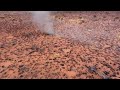 Dust Devil blowing through burnt desert country