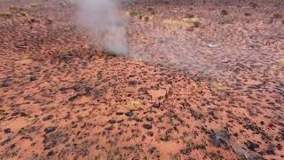 Dust Devil blowing through burnt desert country