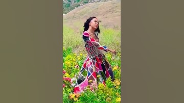 Thumbnail of Doja and Post Malone dancing in a field