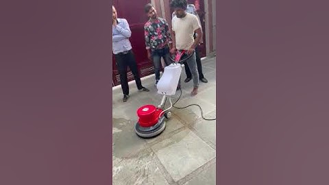 FLOOR SCRUBBING MACHINE