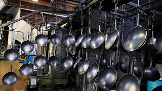 The process of mass-producing woks. A Japanese pot factory that makes 600,000 pots a year.