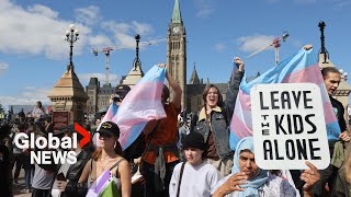 Dueling protests over the issue of transgender policy in schools held in cities across Canada