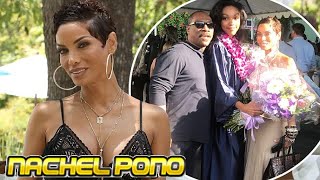 Nicole Murphy, 50, flaunts taut tummy in black lace bra-top