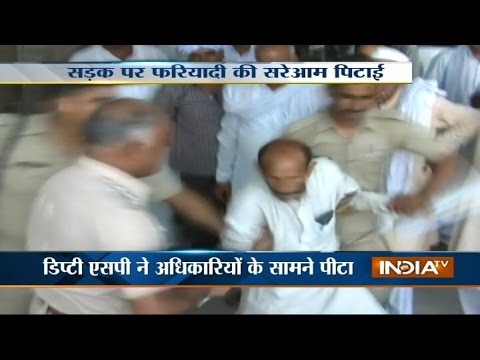 Shocking: Man beaten up by the deputy SP on Tehsil divas in Bagpat, UP - India TV