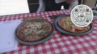 Dean makes pizza on the grill