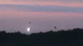 Disturbing UFO activity! 3 UFOs landing in Forest, July 2014