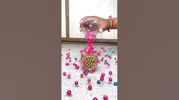 Beads Falls out of Glass #reverse #shorts #satisfying #entertaining #fun #beads #short #asmr #funny