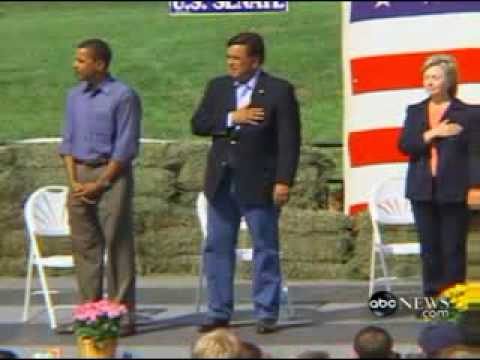 obama flag heart hand anthem over salute national barack putting michelle hussein his american respect during don president something refuses