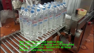 Máy chiết rót nước uống đóng chai 1,5 lít tự động