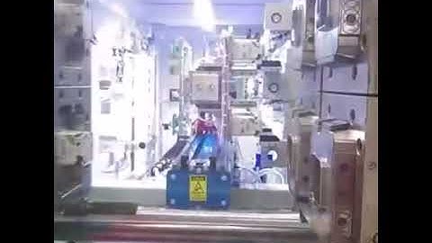 injection molding machine | 4 cavity wrap & buttom label iml robot and camera control