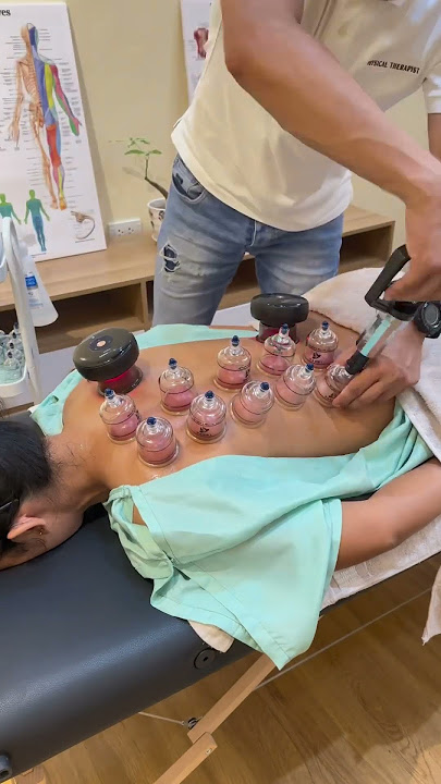 Heated muscle scraping tool combines cupping device for back recovery. #massagetherapy