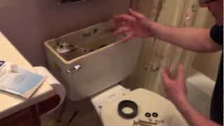 How To Fix a Leaking Toilet Tank  Toilet Tank Repair  Remove Rusted Toilet Bolts