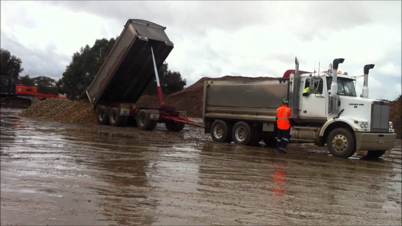 Truck and dog tipping - YouTube