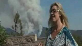 Lady auctioneer laura dotson reports on wildfire in oak glen yucaipa
california august 30th. 2009. spectacular shots of helicopter fire
fighter pilots scoopi...