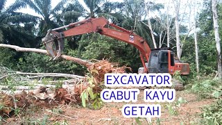#excavator cabut kayu getah