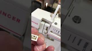 How to remove the top cover from a modern singer (model 9015) sewing machine