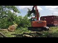 Loading brash with doosan dx140