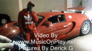 Birdman's New Red Bugatti Veyron Sports Car