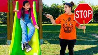 Jannie and Charlotte Playing with Slides at the Park Playground