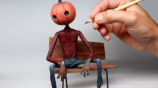 I Sculpted a Pumpkin Guy Sitting on a Bench  Halloween Polymer Clay Sculpture