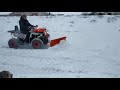 Квадроцикл FORTE 200 чистит снег
