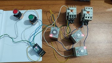 S/w 1 puss 5 sec m1 on 5 sec m2 on 5 sec off. Motor control automation.