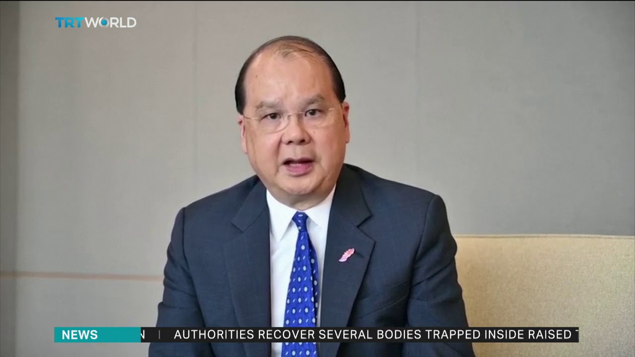 Hong Kong government asks protesters to leave newspaper mockup