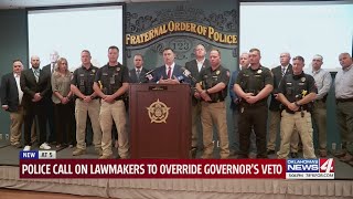 Police call on lawmakers to override governor's veto