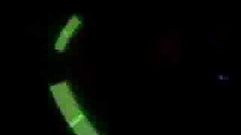 Green Glowsticks on Strings at Party