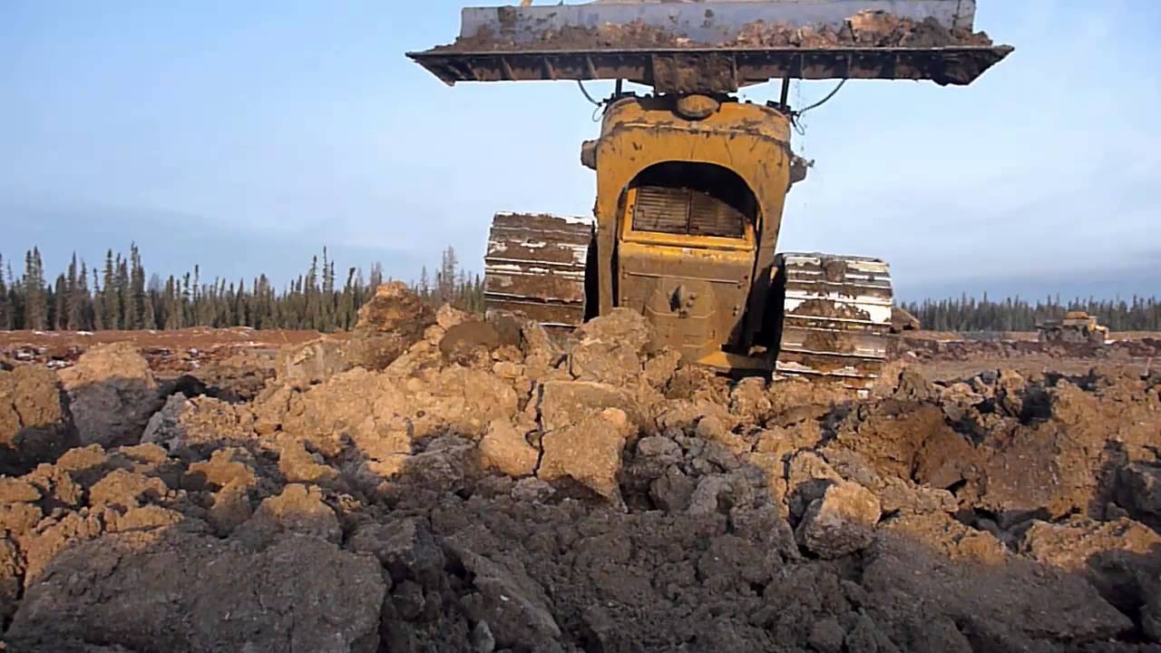 Caterpillar D6T LGP - pushing piles - YouTube