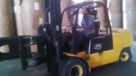 Forklift with Paper Roll Clamp attachment Application and stacking