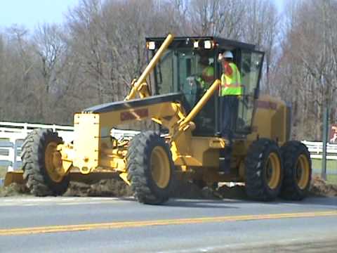 Champion Motor Grader C110C doing shoulder work.