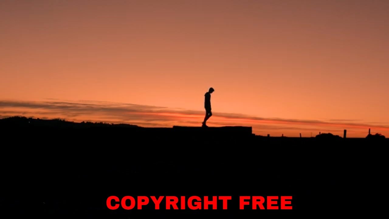 Silhouette Of A Man Walking During Sunset | Copyright Free Stock Video ...
