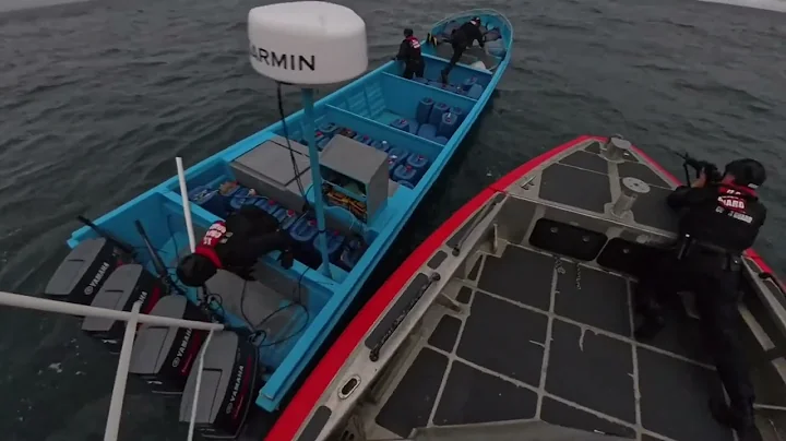 SINK AND SWIM! - Coast Guard crews intercept a Drug Smuggling Vessel