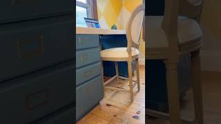 How to make a desk from two cabinets and one box of flooring found at Habitat for Humanity ReStore
