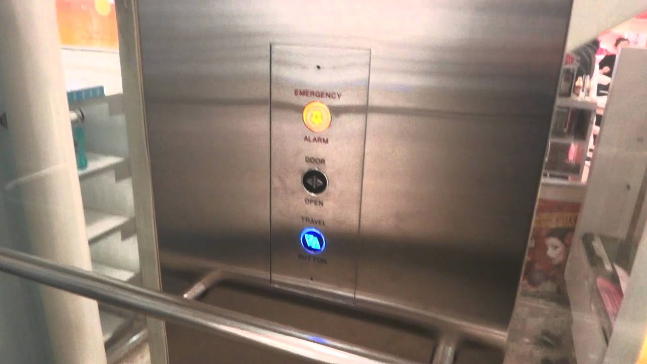 UK two-stage hydraulic elevator at Boots, Brighton
