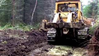 Caterpillar D7 F  bulldozing logging road