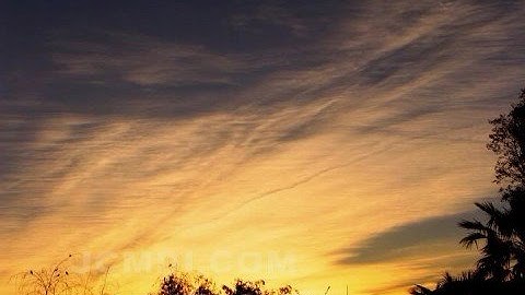 V01726 Stratus rolling wave time lapse with contrail