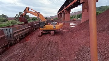 Komatsu Excavator PC450LC loading Iron ore Lumps in railway wagon || @mega machines channel