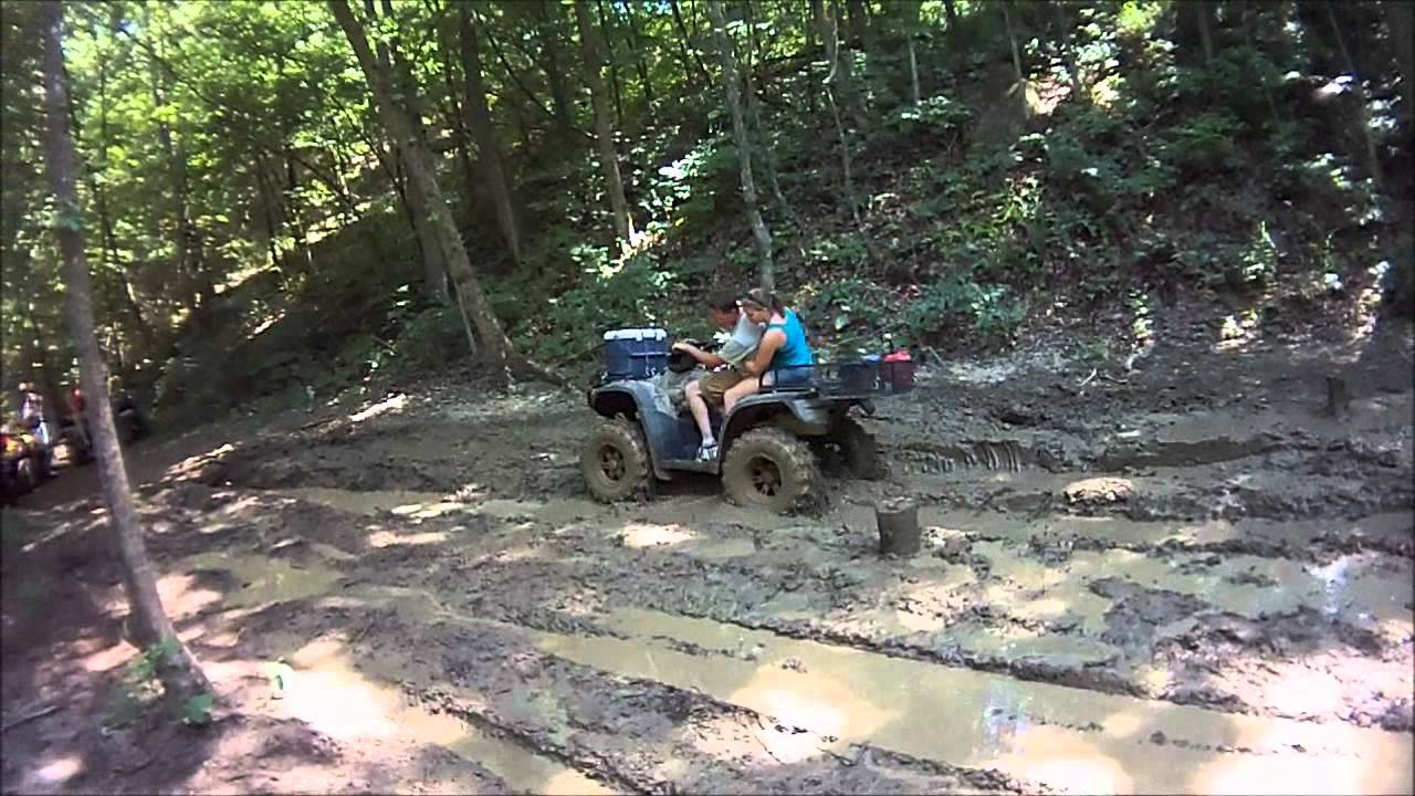 ATV's playing in the mud pits at Sandtown Ranch near Batesville