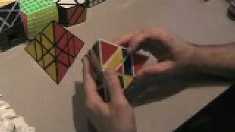 Three Mastermorphix custom twisty puzzles