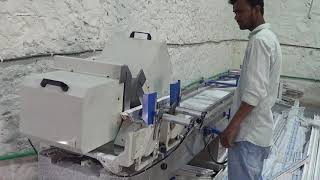 Double head cutting machine for upvc windows and doors