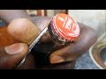 How to open a coca cola bottle using a key