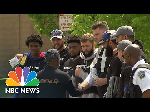 Buffalo Bills Visit Tops Grocery Store To Pay Their Respects To Shooting Victims