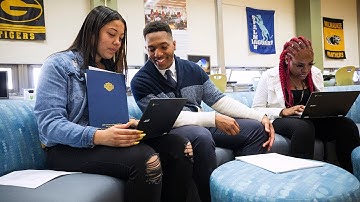 UWM grad uses own experiences to help guide high school students