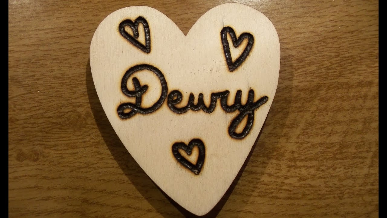 Engraving a name on a wooden heart (Christmas decoration) PYROGRAPHY