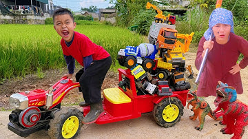 Em tu bi xe cẩu múc cát lên xe ben, máy xúc điều khiển từ xa làm việc cứu hộ xe trộn bê tông bị kẹt